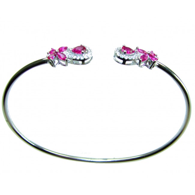 Giovanna 7.2 carat Mozambique Ruby .925 Sterling Silver .925 Sterling Silver dipped in rhodium Statement Bracelet - Sterling silver bracelet with rubies, top view.