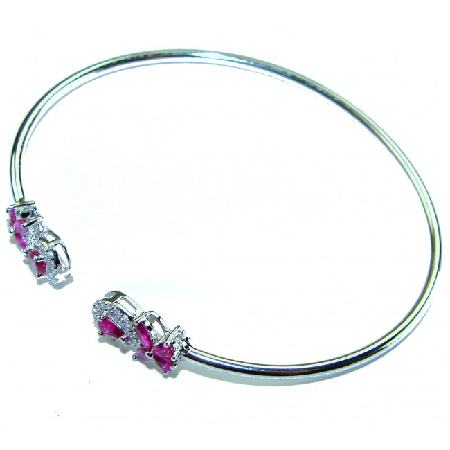 Giovanna 7.2 carat Mozambique Ruby .925 Sterling Silver .925 Sterling Silver dipped in rhodium Statement Bracelet - Sterling silver bracelet with ruby details, side view.