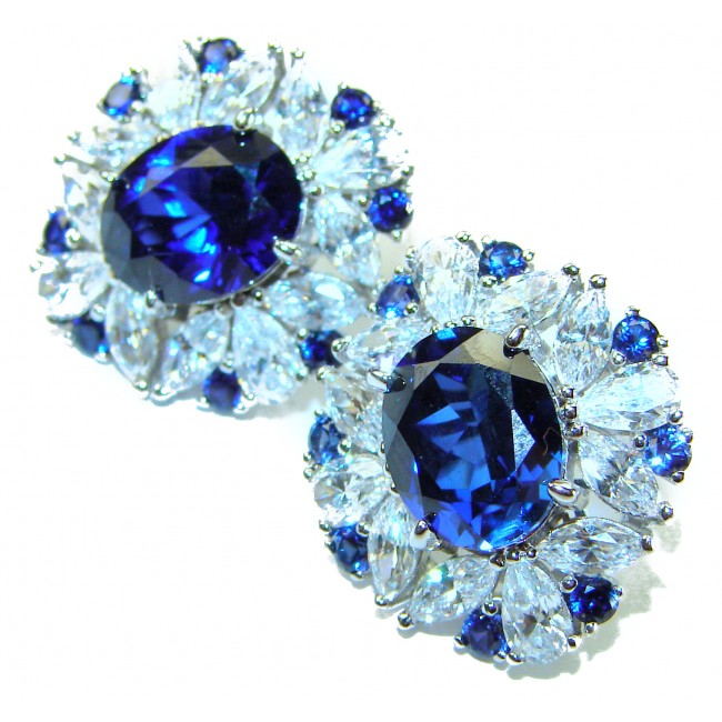 Gabriella 6.2 carat authentic Sapphire .925 Sterling Silver handcrafted Statement earrings - Close-up of sapphire and sterling silver earrings with detailed stones.