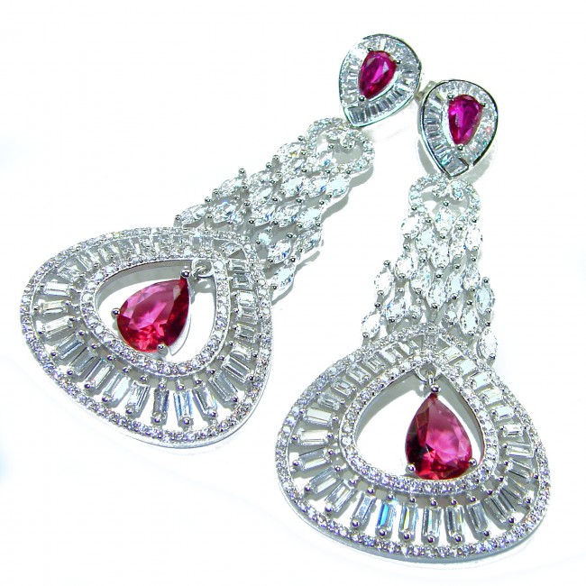 Pure Luxury 22.2 carat natural Ruby .925 Sterling Silver handmade Statement earrings - Close-up of sterling silver earrings with natural ruby stones.