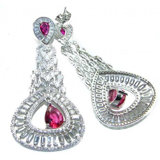Pure Luxury 22.2 carat natural Ruby .925 Sterling Silver handmade Statement earrings - Close-up of dangling ruby earrings in sterling silver.