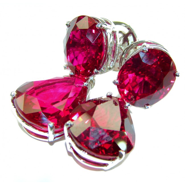 Authentic 36.9 carat Mozambique Ruby .925 Sterling Silver brilliantly handcrafted earrings - Close-up of Mozambique ruby stones in .925 sterling silver settings.