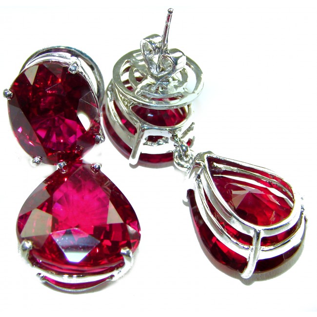 Authentic 36.9 carat Mozambique Ruby .925 Sterling Silver brilliantly handcrafted earrings - Close-up of Mozambique ruby earrings in .925 sterling silver settings.