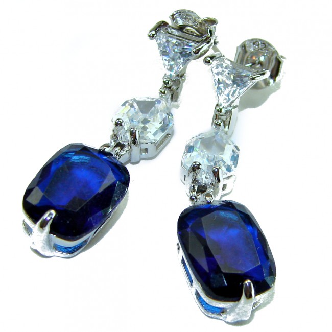 Blue Royalty 14.2 carat Sapphire .925 Sterling Silver earrings - Blue sapphire earrings close-up, showing stones and silver prong detail.