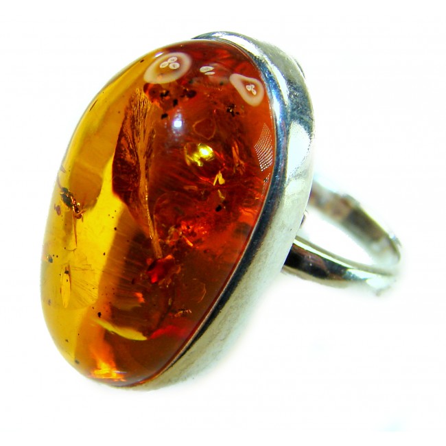 Beauty of the Nature Baltic Amber .925 Sterling Silver handcrafted ring; s. 7 adjustable - Close-up of Baltic amber ring with .925 sterling silver band.