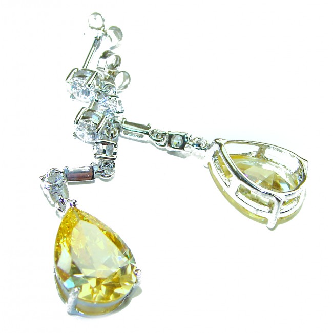 Luxurious Oval cut 8.5 carat Yellow Sapphire .925 Sterling Silver handcrafted earrings - Yellow sapphire earrings, close-up view, highlighting stones and settings.