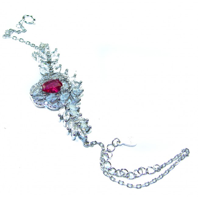 Natural 6.7 carat Ruby .925 Sterling Silver handmade Statement Bracelet - Ruby and silver bracelet, top view, showcasing clasp and gemstones.