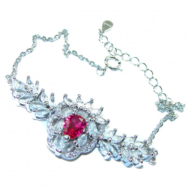 Natural 6.7 carat Ruby .925 Sterling Silver handmade Statement Bracelet - Ruby bracelet close-up on white background, showcasing clasp and stones.