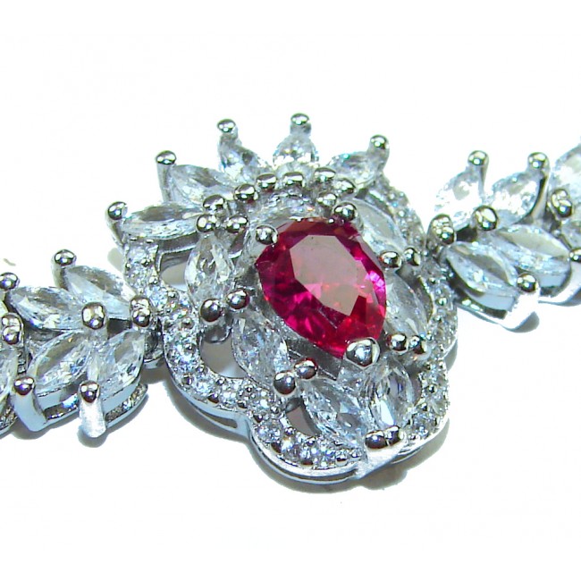 Natural 6.7 carat Ruby .925 Sterling Silver handmade Statement Bracelet - Close-up of natural ruby and sterling silver jewelry design.