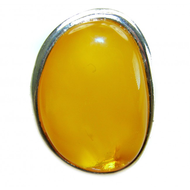 Authentic Golden Butterscotch Baltic Amber .925 Sterling Silver entirely handcrafted ring; s. 7 adjustable - Close-up of golden butterscotch Baltic amber set in sterling silver.