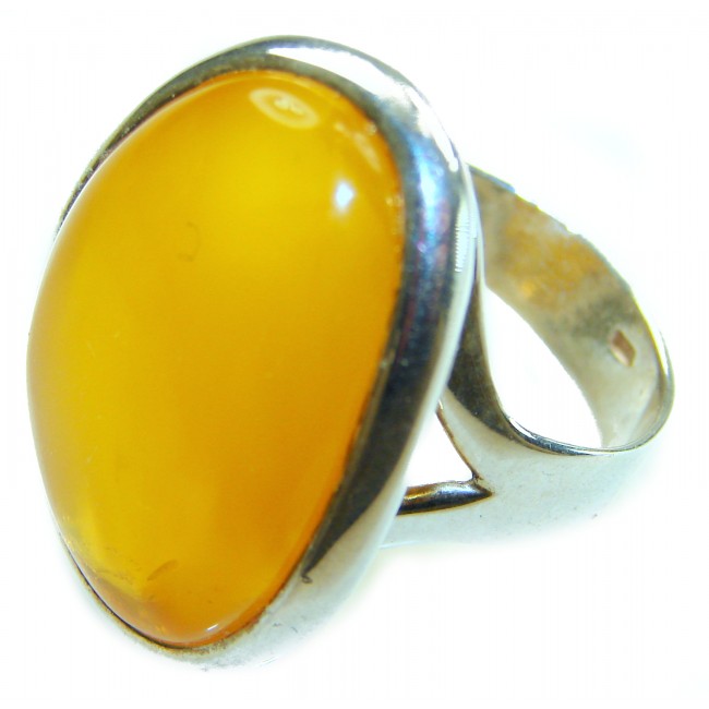 Authentic Golden Butterscotch Baltic Amber .925 Sterling Silver entirely handcrafted ring; s. 7 adjustable - Close-up of golden butterscotch Baltic amber ring in sterling silver.