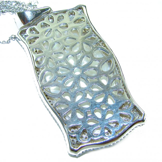 Precious Blister Pearl 2.4 carat Ruby .925 Sterling Silver .925 Sterling Silver Necklace; 24 inches long - Back view of intricate filigree on sterling silver pendant necklace.