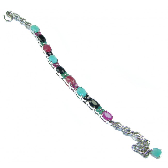 Tiffany 26.8 caratVCOLOMBIAN EMERALD Ruby Sapphire .925 Sterling Silver handcrafted Bracelet - Side view of a multicolored gemstone bracelet with silver chain.
