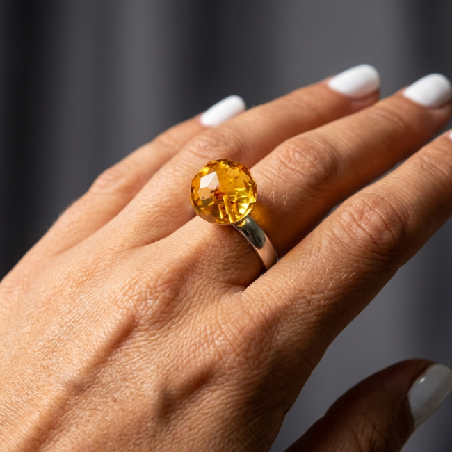 Modern Concept Golden Sphere - Natural faceted Baltic Amber 18K Gold over .925 Sterling Silver ring s. 8 - Ring with faceted Baltic Amber, worn on hand, close-up view.