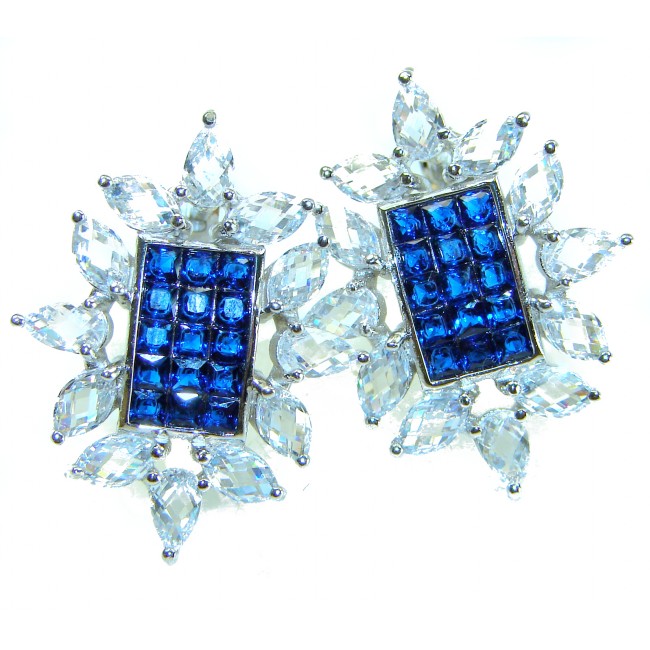 Born to Glam authentic 10.5 carat Sapphire .925 Sterling Silver handcrafted earrings - Front view of sapphire and clear stone earrings on white background.