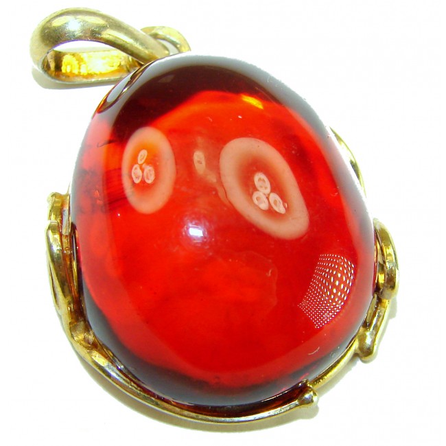 Prehistoric Authentic Baltic Amber .925 Sterling Silver dippedin 14K Gold beautifully handcrafted Pendant