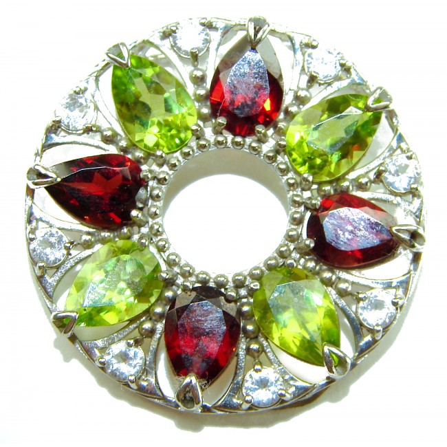 Happiness Authentic 35.5 carat Peridot Garnet .925 Sterling Silver handmade Statement Pendant - Circular gemstone pendant with peridot and garnet, top view.