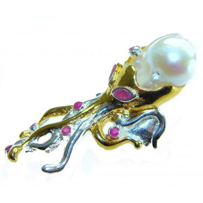 Massive Golden Mother of Pearl Octopus with Ruby eyes 18K Gold over .925 Sterling Silver handcrafted ring s. 8 1/4 - Side view of octopus-shaped gold jewelry with pearl and ruby stones.