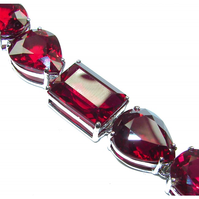Bella Rosa - Magnificent 145.3 carat authentic Ruby .925 Sterling Silver handcrafted Bracelet - Ruby bracelet close-up showing rectangular and pear-cut stones.