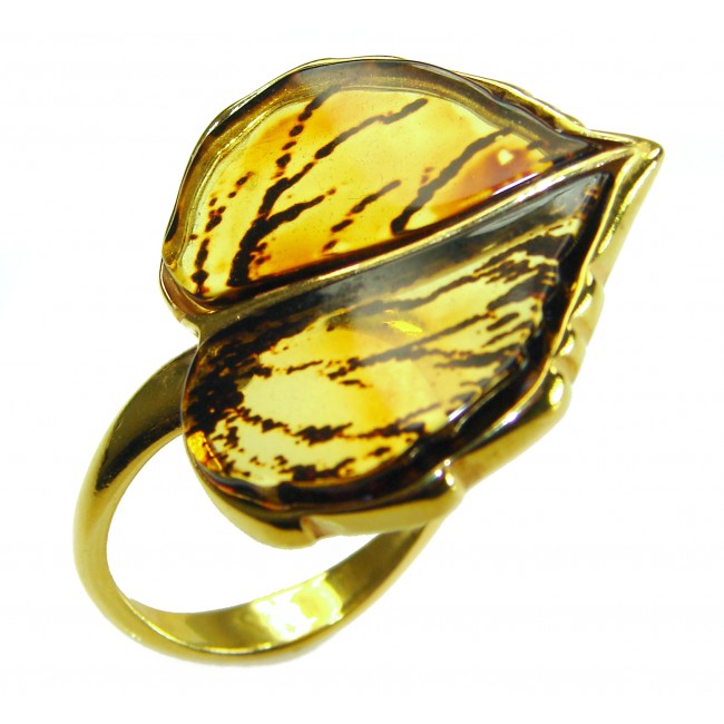 Authentic carved Baltic Amber .925 Sterling Silver dipped in 18K Gold handcrafted ring; s. 8 adjustable - Side view of carved Baltic Amber ring in Sterling Silver setting.