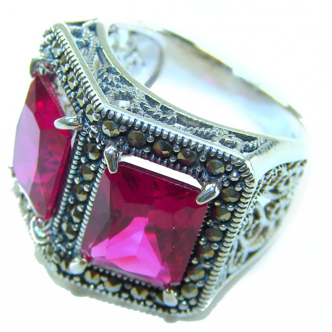 Two Lovers Natural 18.4 carat Ruby .925 Sterling Silver handmade Large Statement Ring size 7 - Close-up of Two Lovers ruby ring in sterling silver, side angle view.