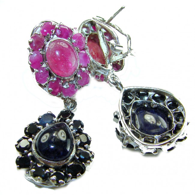 Giovanna - Very Unique - 29.5 carat Sapphire Ruby .925 Sterling Silver dipped in rhodium handcrafted earrings - Close-up of ruby and sapphire earrings with .925 silver setting.