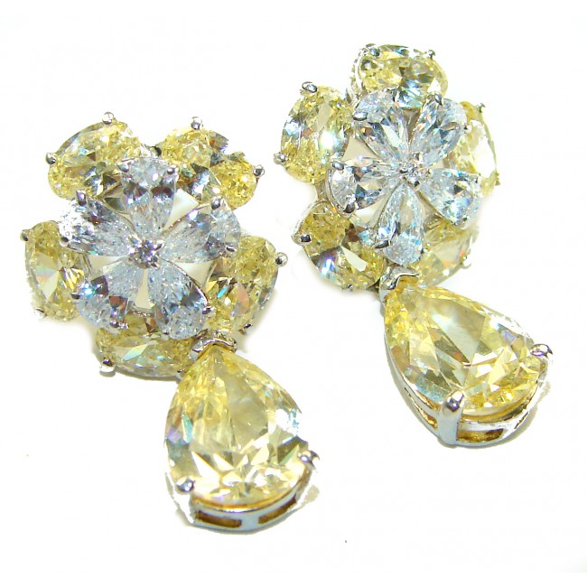 Luxurious 10.5 carat Golden - yellow Montana Sapphire .925 Sterling Silver handcrafted earrings