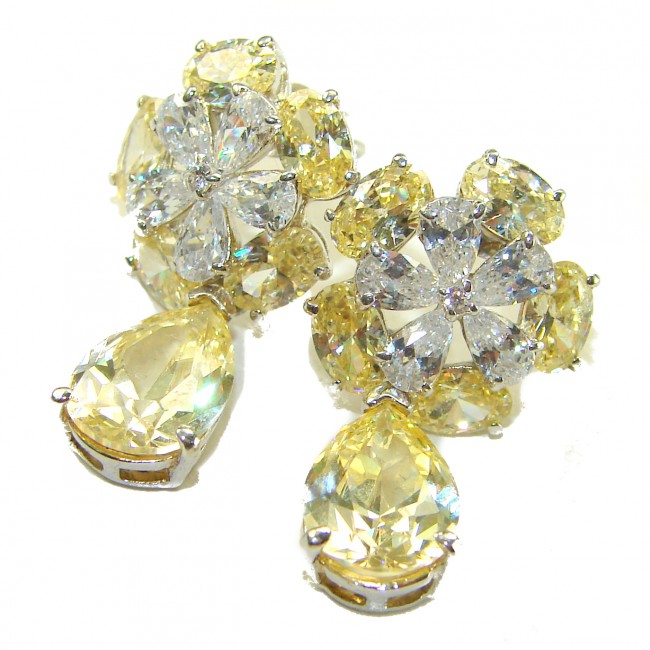 Luxurious 10.5 carat Golden - yellow Montana Sapphire .925 Sterling Silver handcrafted earrings