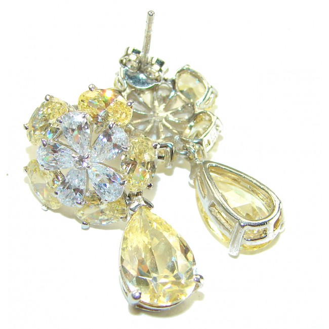 Luxurious 10.5 carat Golden - yellow Montana Sapphire .925 Sterling Silver handcrafted earrings