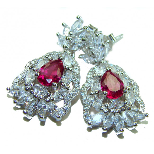 Magnificent Jewel 8.5 carat Ruby .925 Sterling Silver handcrafted incredible earrings - Close-up of ruby and zirconia .925 sterling silver earrings.
