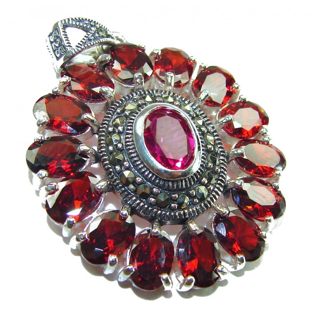 Circle of Life 15.2 carat authentic Ruby Marcasite .925 Sterling Silver handmade Pendant - Close-up of Circle of Life pendant with red rubies and marcasite accents