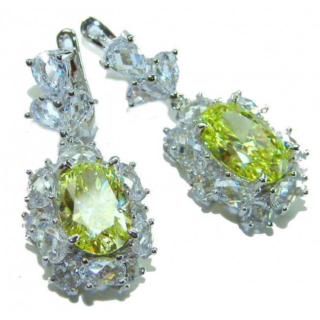 Luxurious 10.5 carat Golden - yellow Montana Sapphire .925 Sterling Silver handcrafted earrings