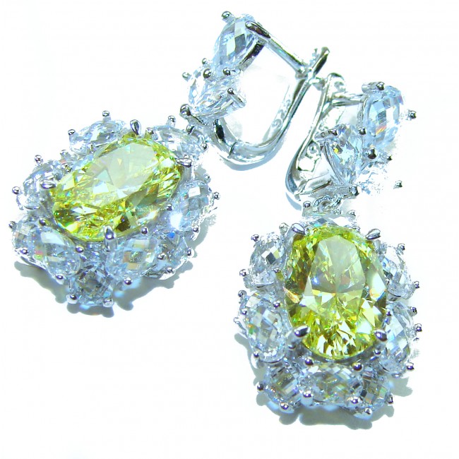 Luxurious 10.5 carat Golden - yellow Montana Sapphire .925 Sterling Silver handcrafted earrings