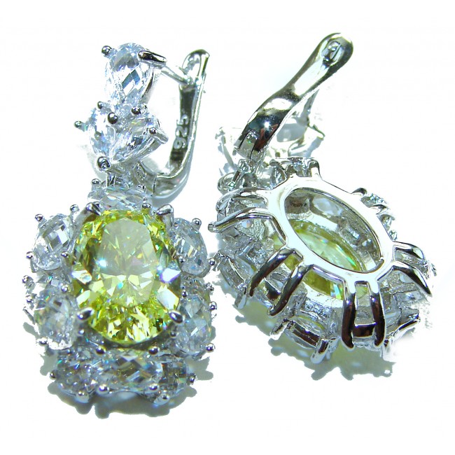 Luxurious 10.5 carat Golden - yellow Montana Sapphire .925 Sterling Silver handcrafted earrings