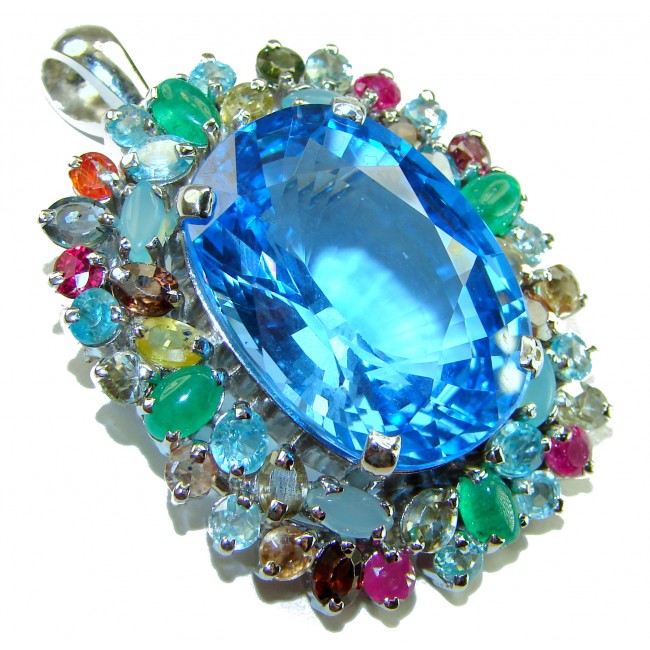 Oceania oval cut 32.8 carat Swiss Blue Topaz .925 Sterling Silver dipped in rhodium Handcrafted Pendant Brooch