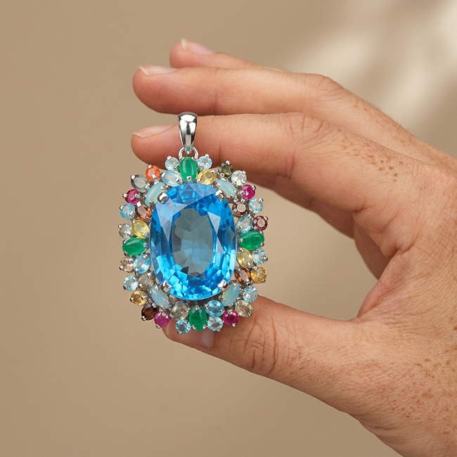 Oceania oval cut 32.8 carat Swiss Blue Topaz .925 Sterling Silver dipped in rhodium Handcrafted Pendant Brooch