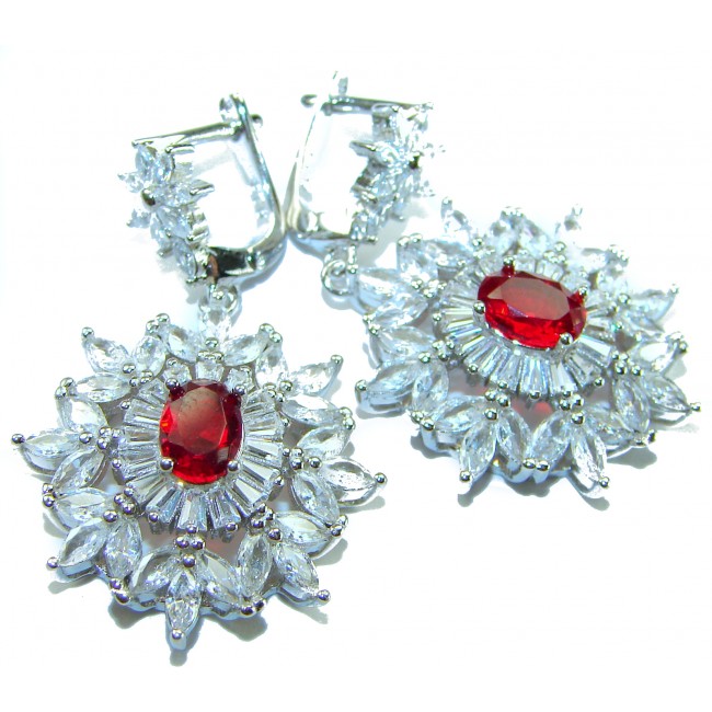 Magnificent Jewel 8.5 carat Ruby .925 Sterling Silver handcrafted incredible earrings - Close-up of ruby and sterling silver earrings, front view.