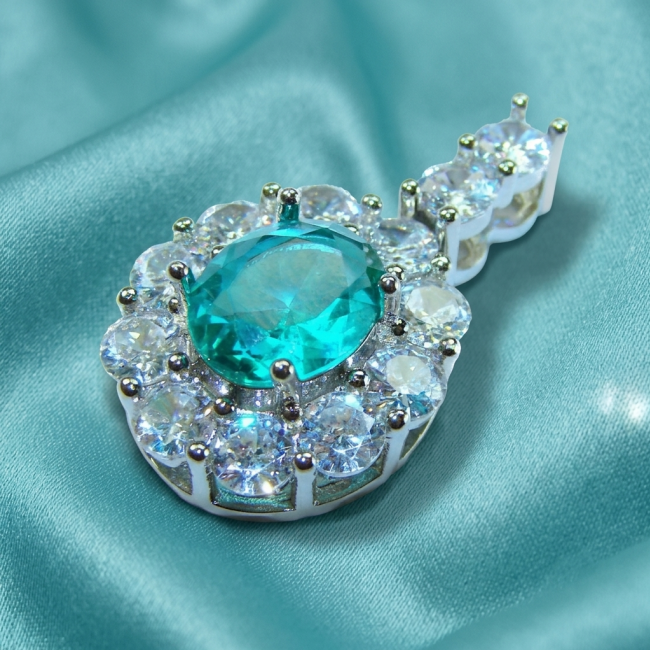 Divine Beauty 8.5 carat Aquamarine .925 Sterling Silver handcrafted pendant - Aquamarine pendant close-up on turquoise fabric background