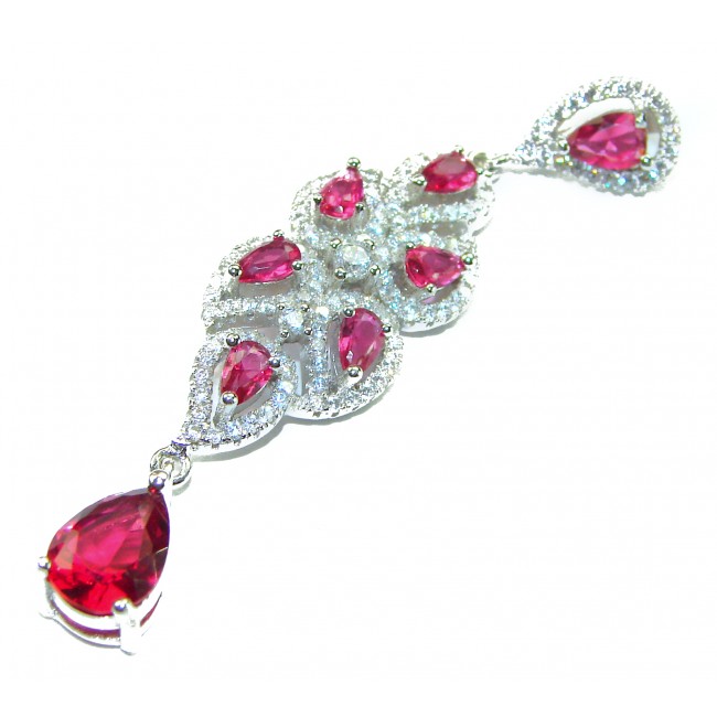 Incredible 12.5 carat Natural Kashmir Ruby .925 Sterling Silver Pendant - Dangling earring with rubies and diamonds, top view.