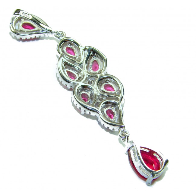 Incredible 12.5 carat Natural Kashmir Ruby .925 Sterling Silver Pendant - Side view of a Kashmir Ruby pendant with .925 Sterling Silver.