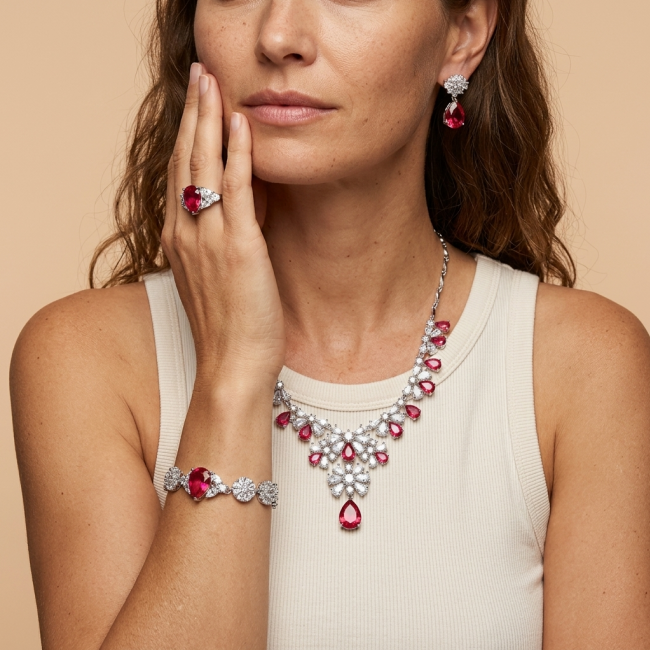 Giovanna - Magnificent Jewel 22.5 carat Ruby .925 Sterling Silver handcrafted incredible Statement necklace - Model wearing Giovanna jewelry set with 22.5ct rubies, front view.