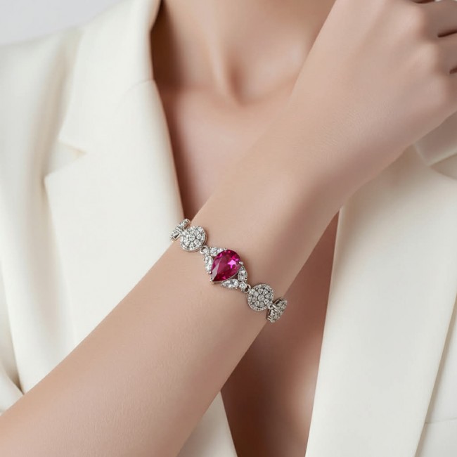 Giovanna - Magnificent Jewel 7.2 carat Ruby .925 Sterling Silver handcrafted incredible Statement Bracelet - Ruby bracelet worn on wrist, close-up view showing details.