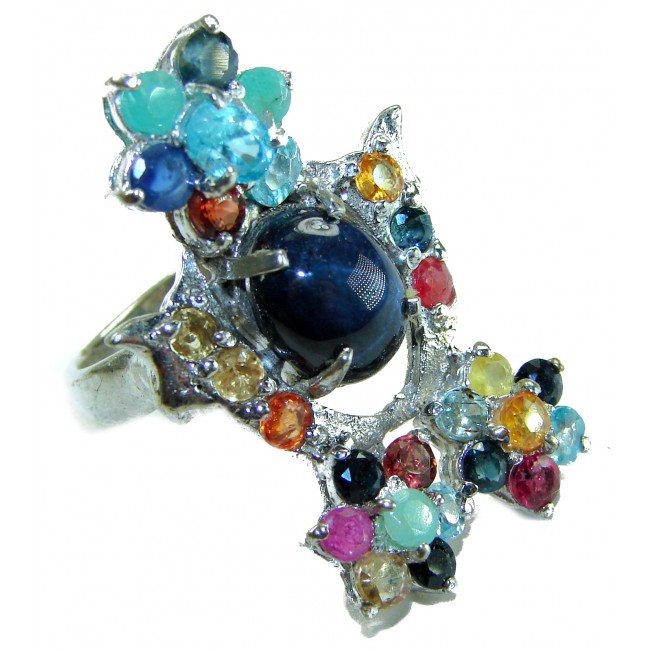 Classic design Genuine 16.5 carat Star Sapphire .925 Sterling Silver handcrafted Ring size 7 - Colorful gemstone ring with star sapphire, angled side view.