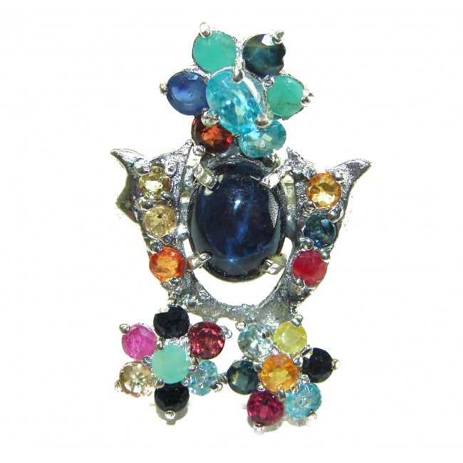 Classic design Genuine 16.5 carat Star Sapphire .925 Sterling Silver handcrafted Ring size 7 - Colorful gemstone and star sapphire pendant, front view.