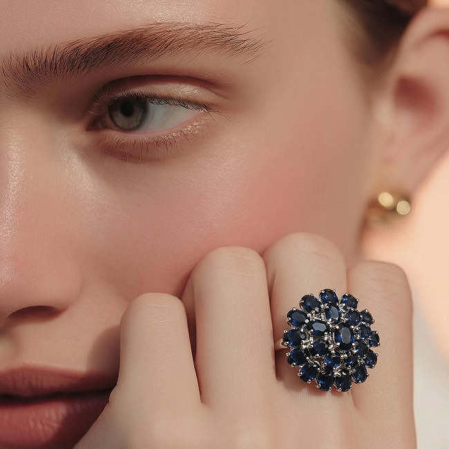 Born to Glam 12.2 carat natural Sapphire .925 Sterling Silver Perfectly handcrafted Ring s. 7 1/4 - Close-up of sapphire ring worn on hand.