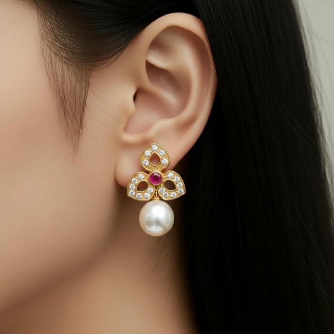 Magnificent Jewel 4.5 carat Ruby 14K Gold over .925 Sterling Silver handcrafted incredible earrings - Earring with ruby and pearl in 14K gold, worn on ear, side view.