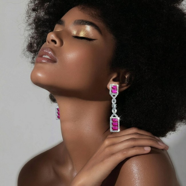 Art Deco - Giovanna - Magnificent Jewel 6.5 carat Ruby .925 Sterling Silver handcrafted incredible earrings - Woman wearing Art Deco ruby earrings, side profile view.