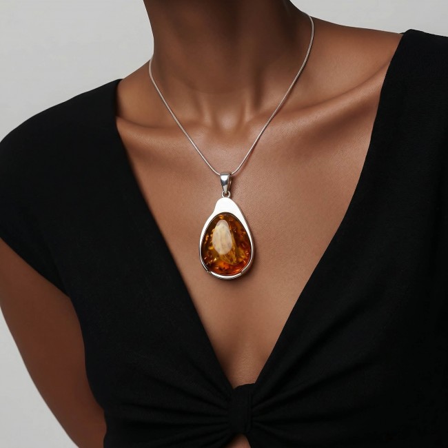 Sea Treasure Prehistoric Authentic Butterscotch Baltic Amber .925 Sterling Silver beautifully handcrafted Pendant