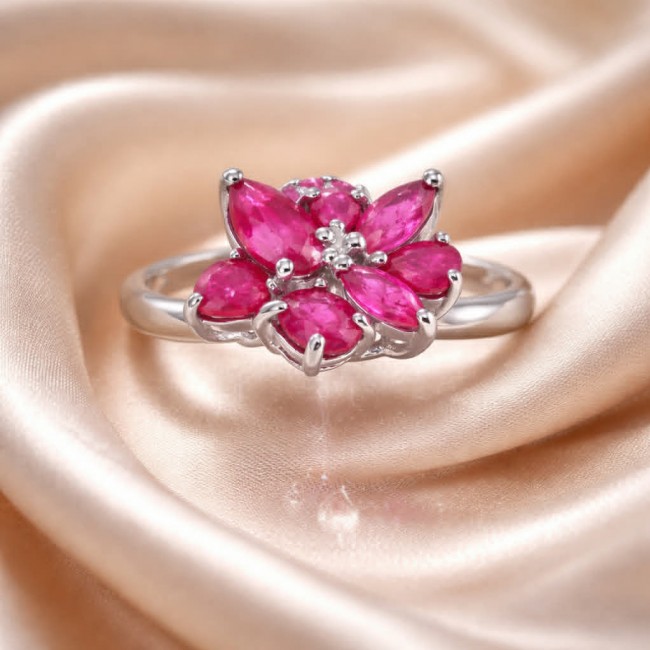 Giovanna -7.5 carat Ruby .925 Sterling Silver handcrafted incredible ring s. 7 - Ruby flower ring on satin background, top view.