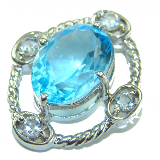 Atlantica oval cut 9.9 carat Swiss Blue Topaz rhodium ver .925 Sterling Silver Handcrafted Pendant